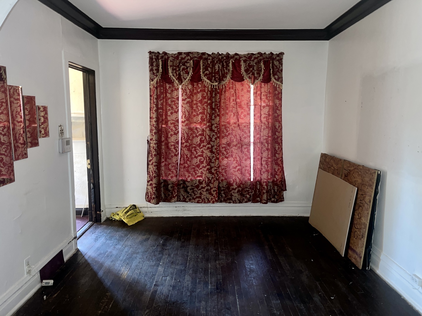 7017 South Wood Street Chicago, IL 60636 - Photo 5 of 25 a view of a room with wooden floor and chair