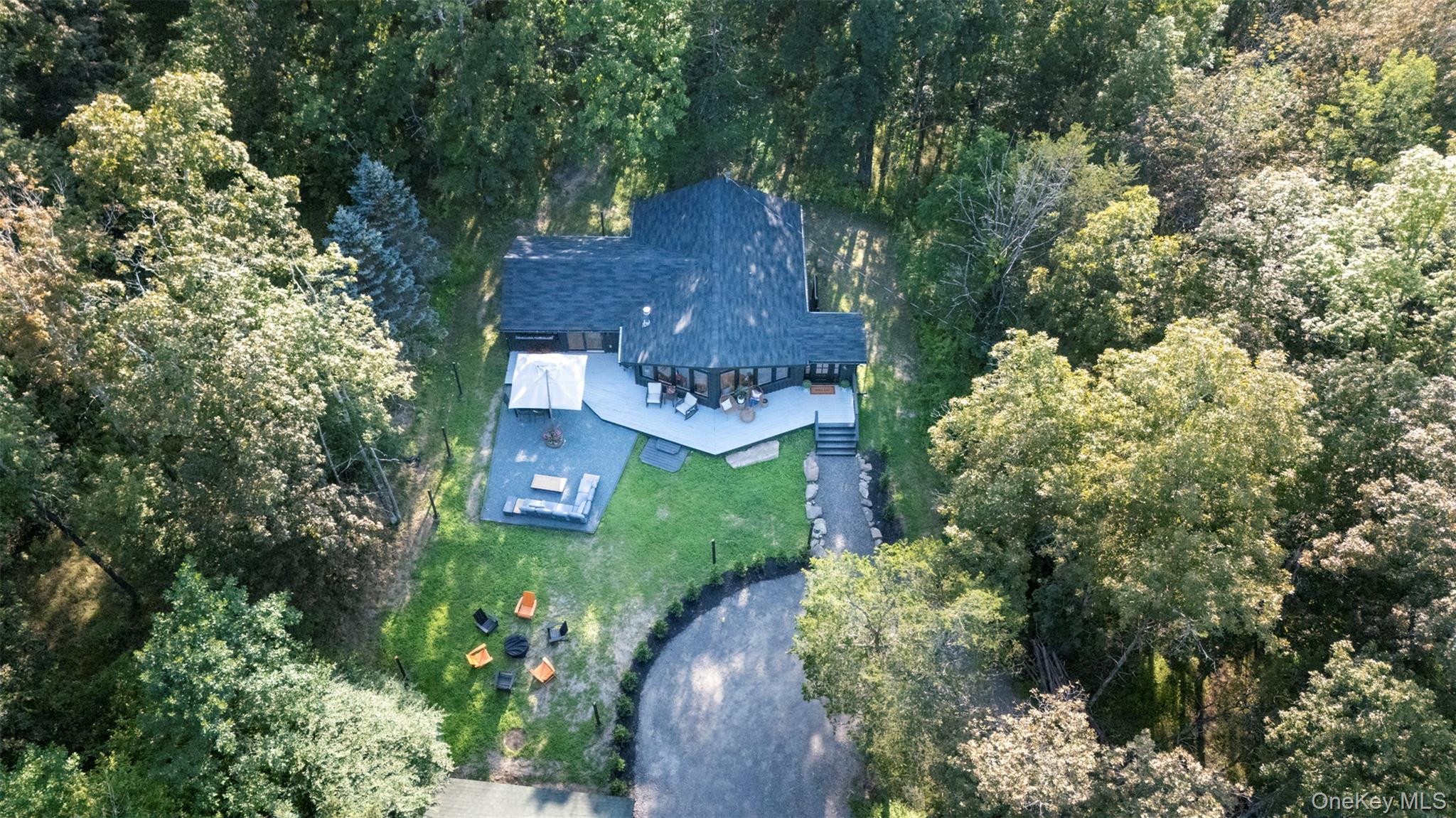 83 Sages Loop Road Kerhonkson, NY 12446 - Photo 23 of 33 an aerial view of a house with a garden