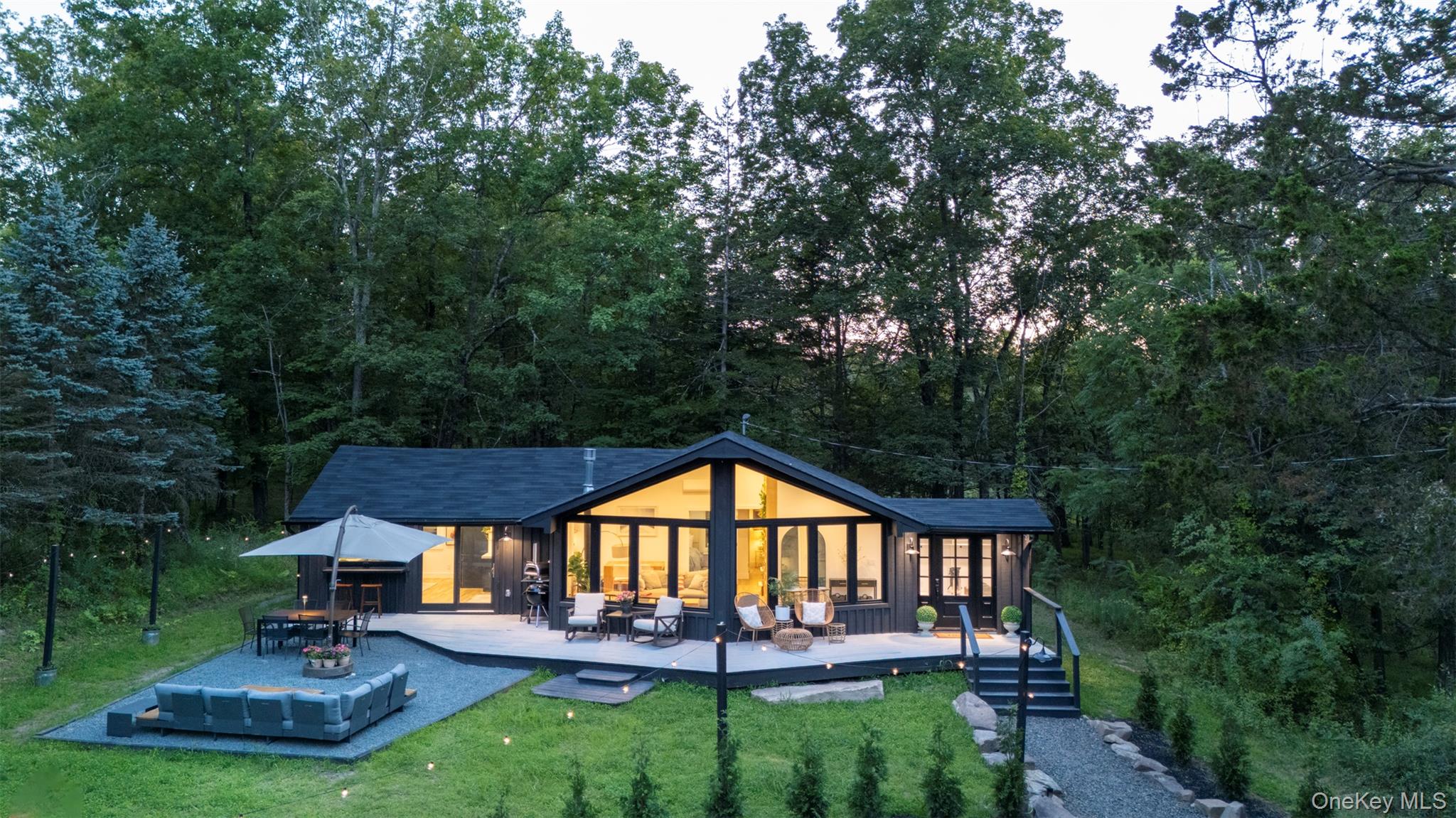 83 Sages Loop Road Kerhonkson, NY 12446 - Photo 27 of 33 a view of a house with backyard and sitting area