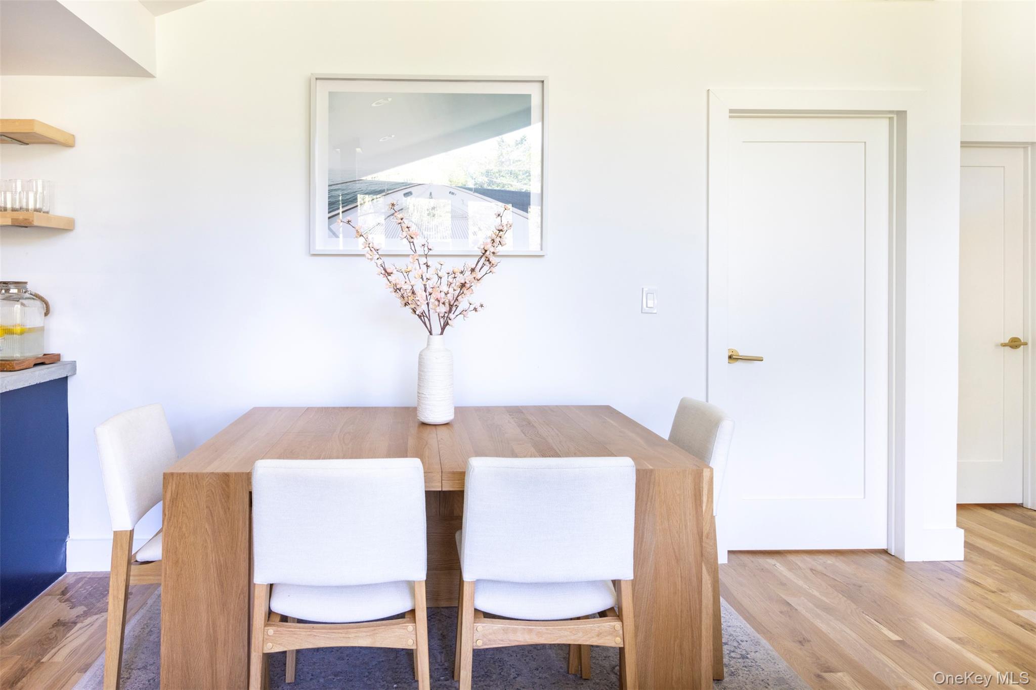 83 Sages Loop Road Kerhonkson, NY 12446 - Photo 9 of 33 a view of a dining room with furniture and wooden floor