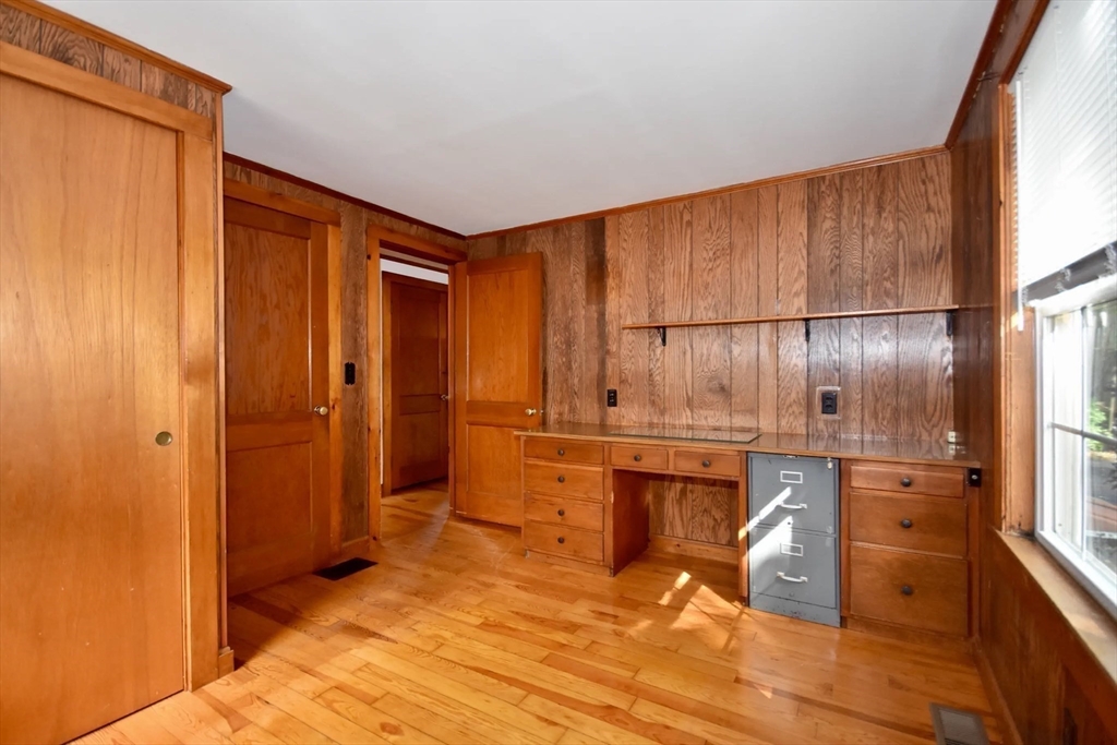 58 Main Avenue Wareham, MA 02558 - Photo 18 of 39 a room with stainless steel appliances wooden floor and door