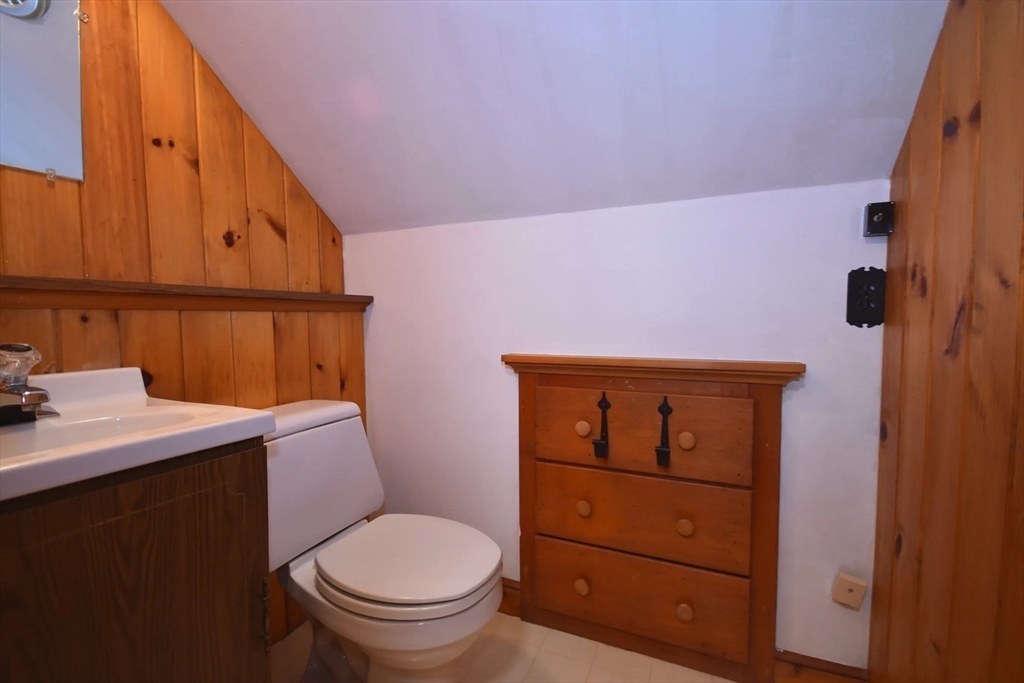 58 Main Avenue Wareham, MA 02558 - Photo 21 of 39 a bathroom with a toilet a sink and vanity