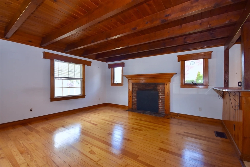 58 Main Avenue Wareham, MA 02558 - Photo 9 of 39 a view of an empty room with wooden floor and a window