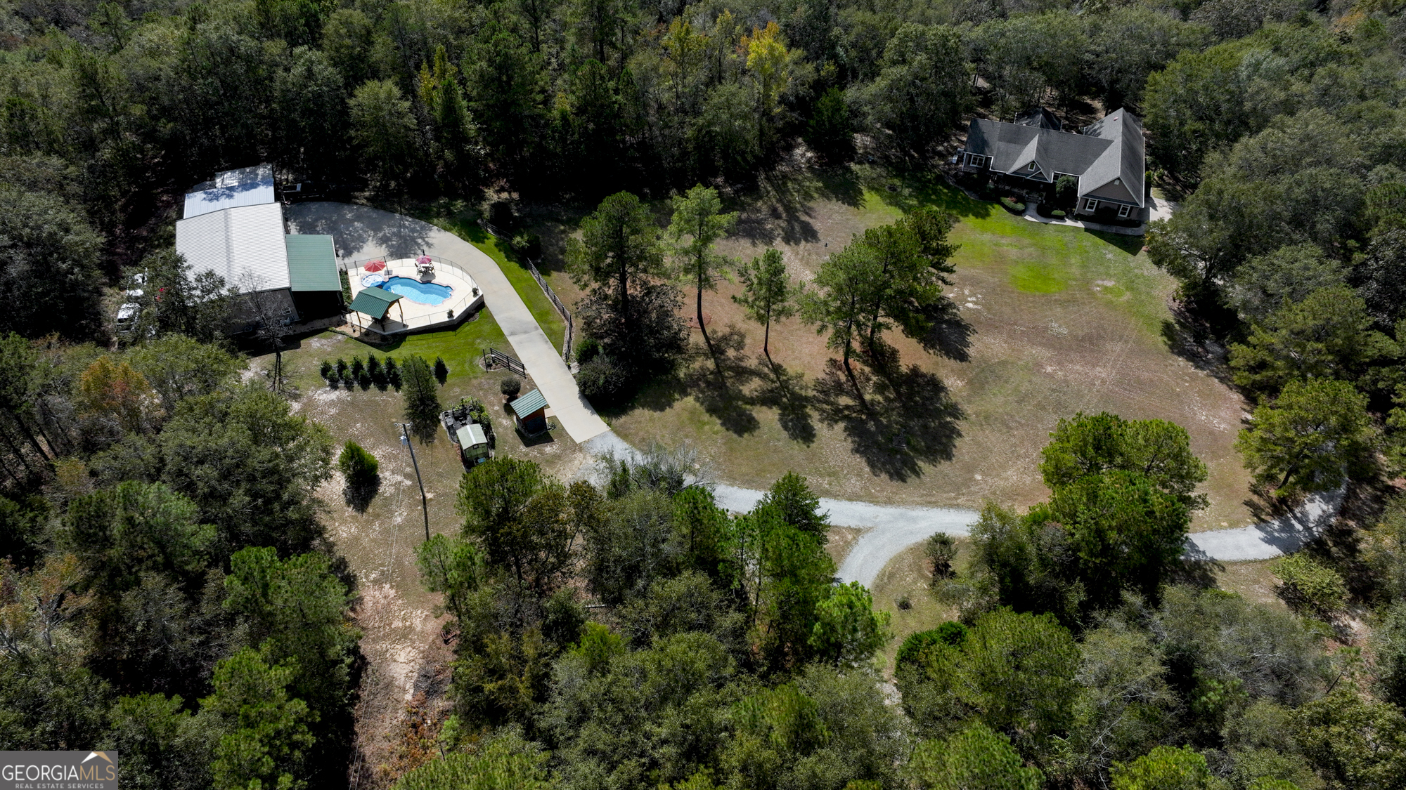 2690 East Lawson Merritt Road Fort Valley, GA 31030 - Photo 23 of 23 an aerial view of house with yard swimming pool and outdoor seating