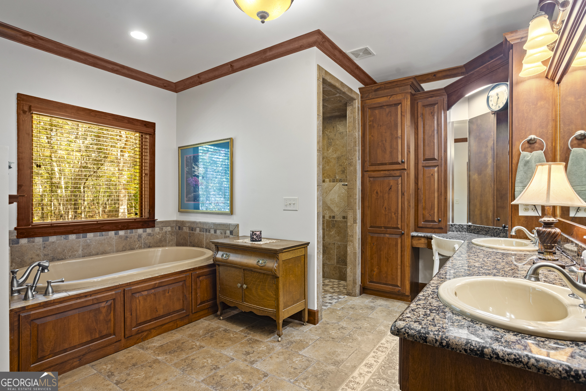 2690 East Lawson Merritt Road Fort Valley, GA 31030 - Photo 6 of 23 a bathroom with a granite countertop tub sink and mirror