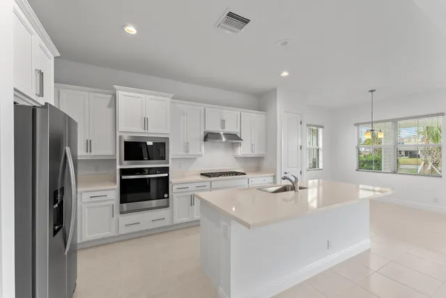 a view of an empty room with a sliding door