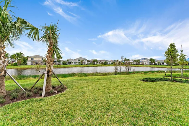 a view of a house with a back yard