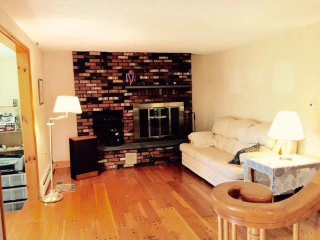 263 Boom Road Saco, ME 04072 - Photo 11 of 23 Living Room with gas Fireplace
