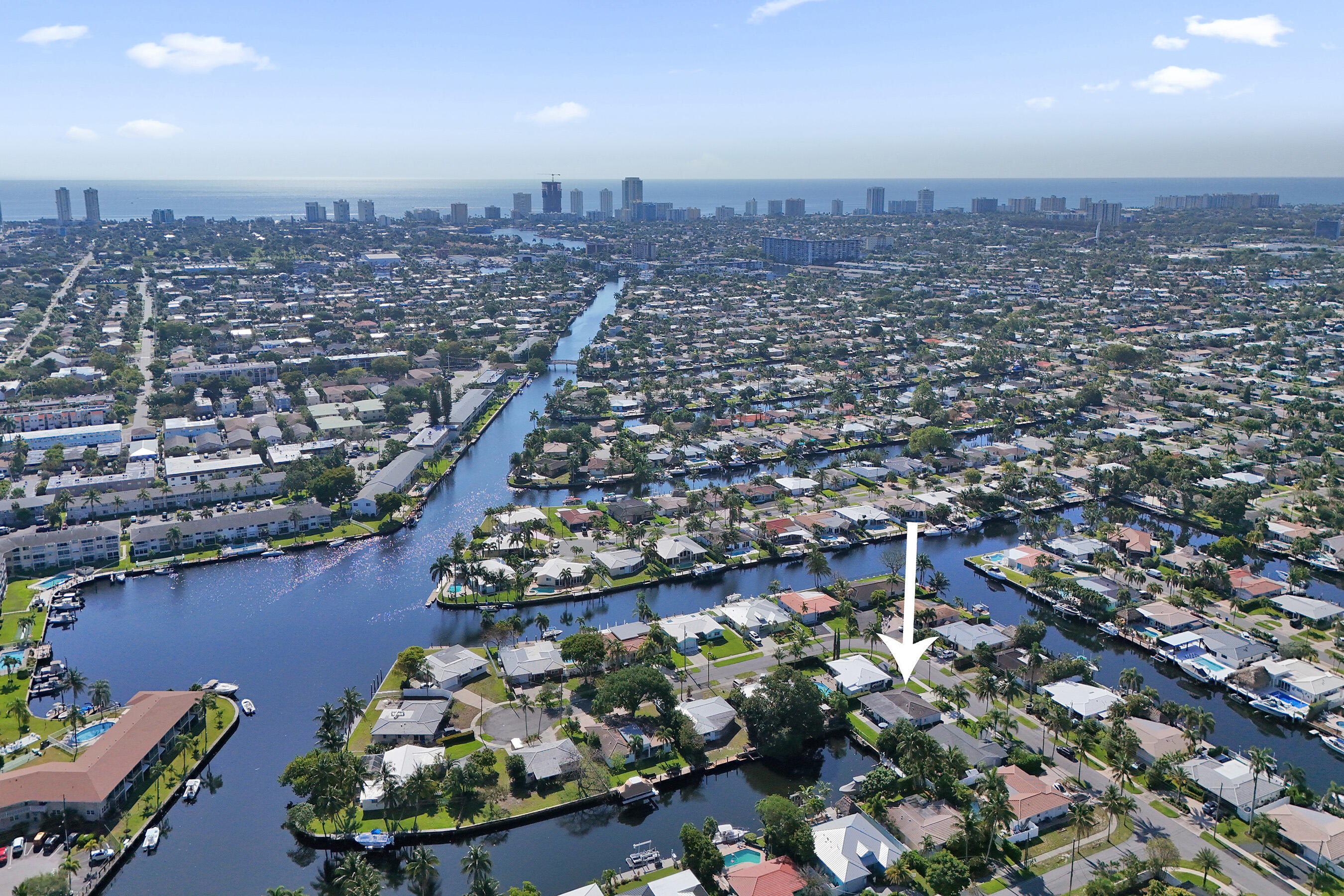 381 Southeast 3rd Street Pompano Beach, FL 33060 - Photo 36 of 41 an aerial view of a city with lots of residential buildings