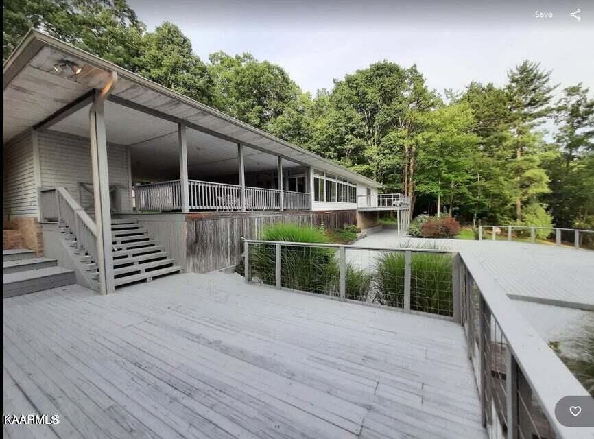 704 Cooper Lake Road Oneida, TN 37841 - Photo 22 of 37 Back of Main Home from Cabin Porch