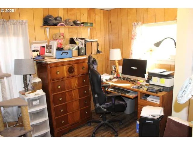 a workspace with furniture and a window