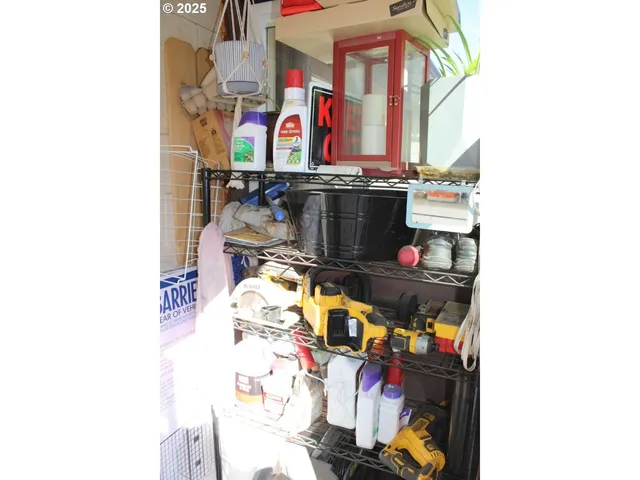 a utility room with lots of clutter