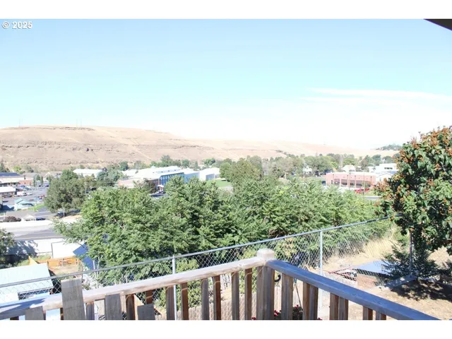 a view of a city from a balcony