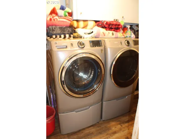a utility room with dryer and washer
