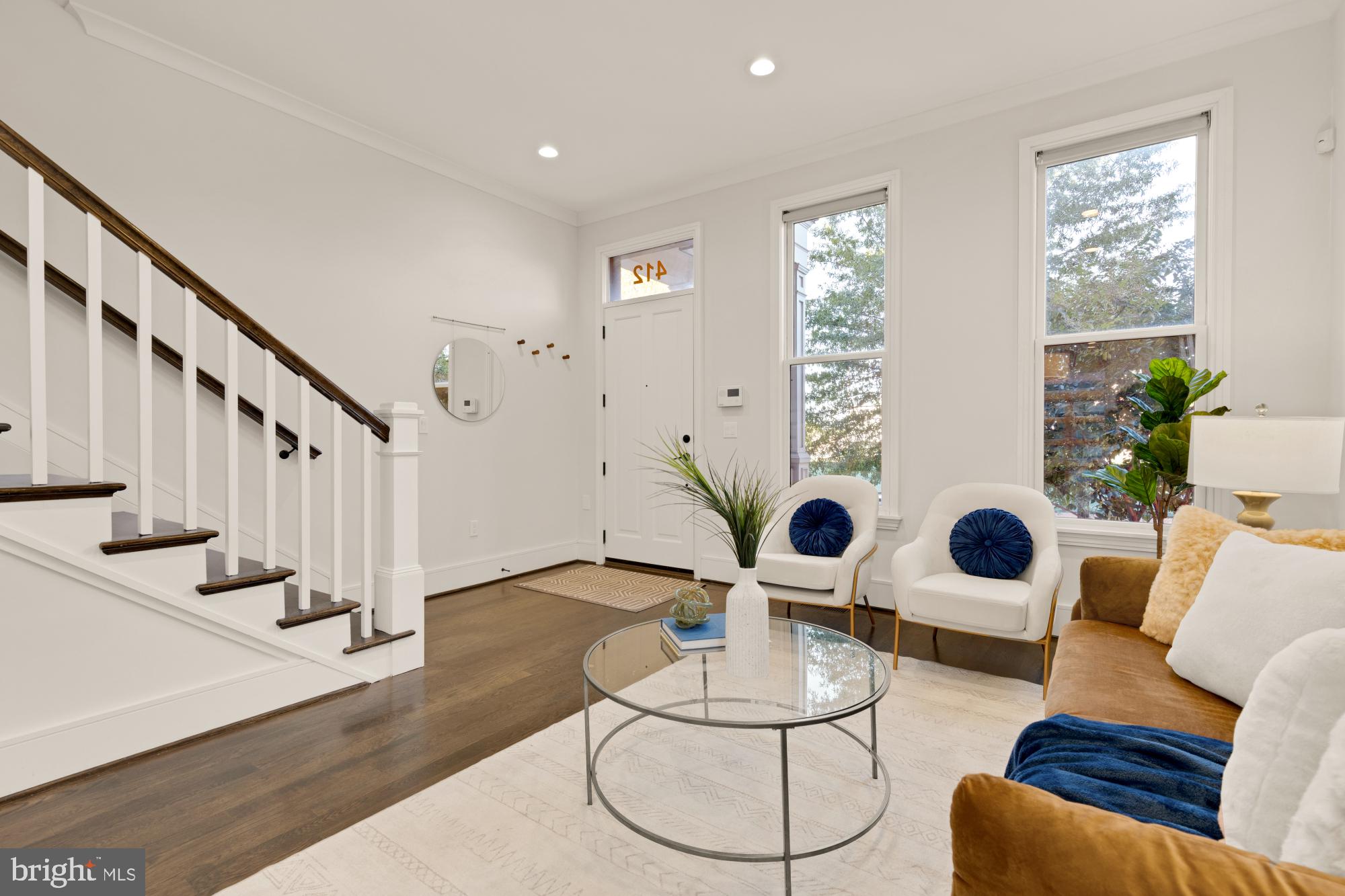 412 13th Street Southeast Washington, DC 20003 - Photo 18 of 62 a living room with furniture and wooden floor
