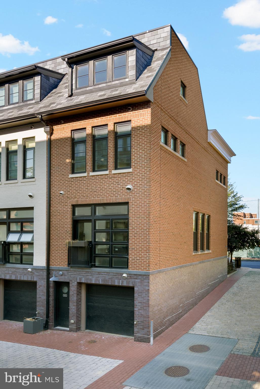 412 13th Street Southeast Washington, DC 20003 - Photo 47 of 62 a front view of a house with a yard