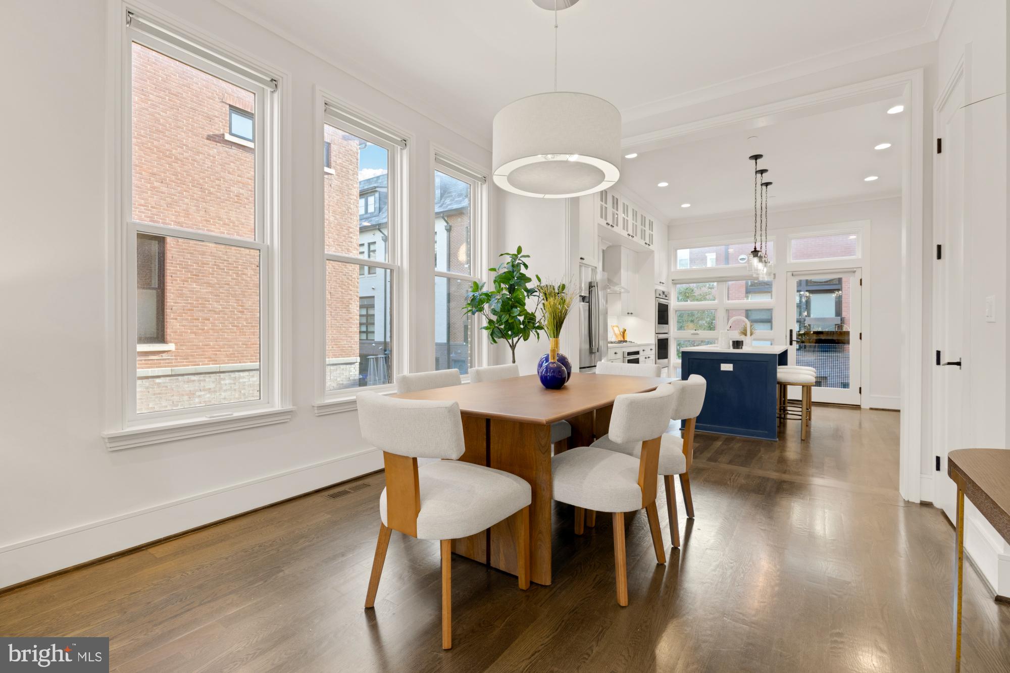 412 13th Street Southeast Washington, DC 20003 - Photo 4 of 62 a view of a dining room with furniture and wooden floor