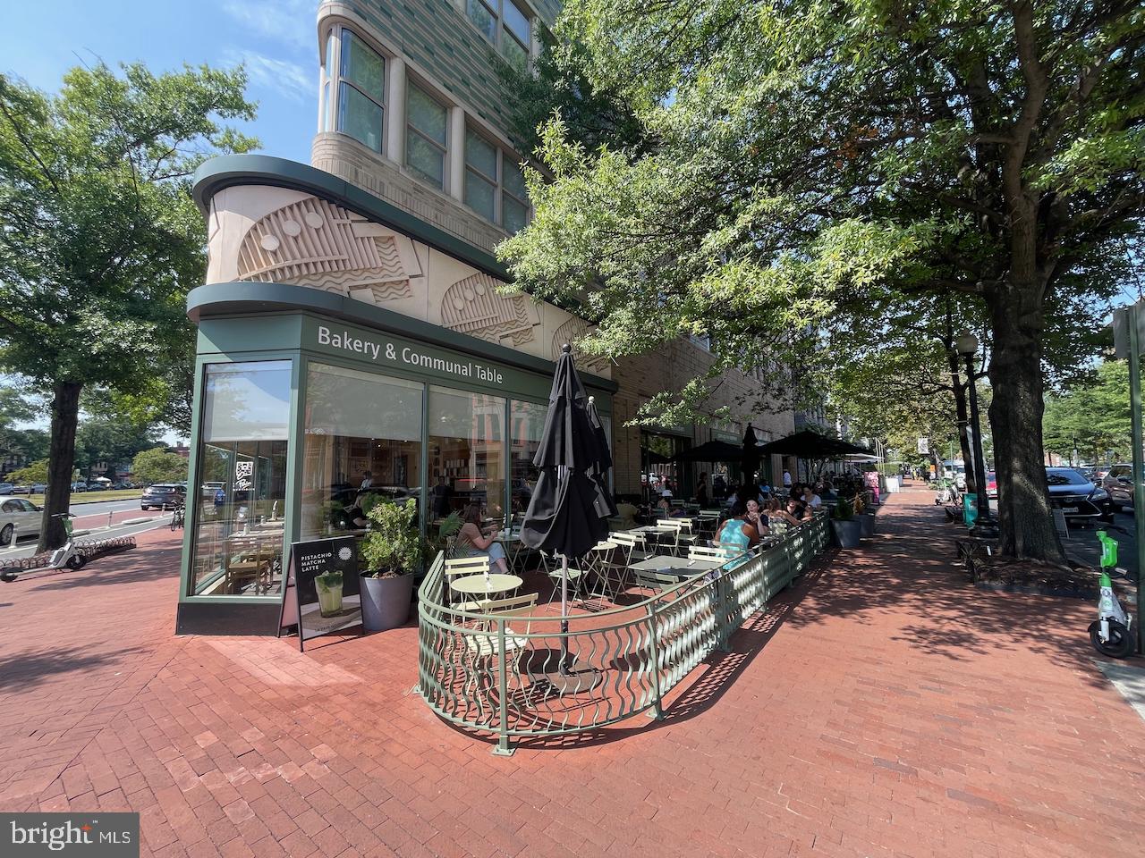 412 13th Street Southeast Washington, DC 20003 - Photo 57 of 62 a view of a patio with a table and chairs and potted plants