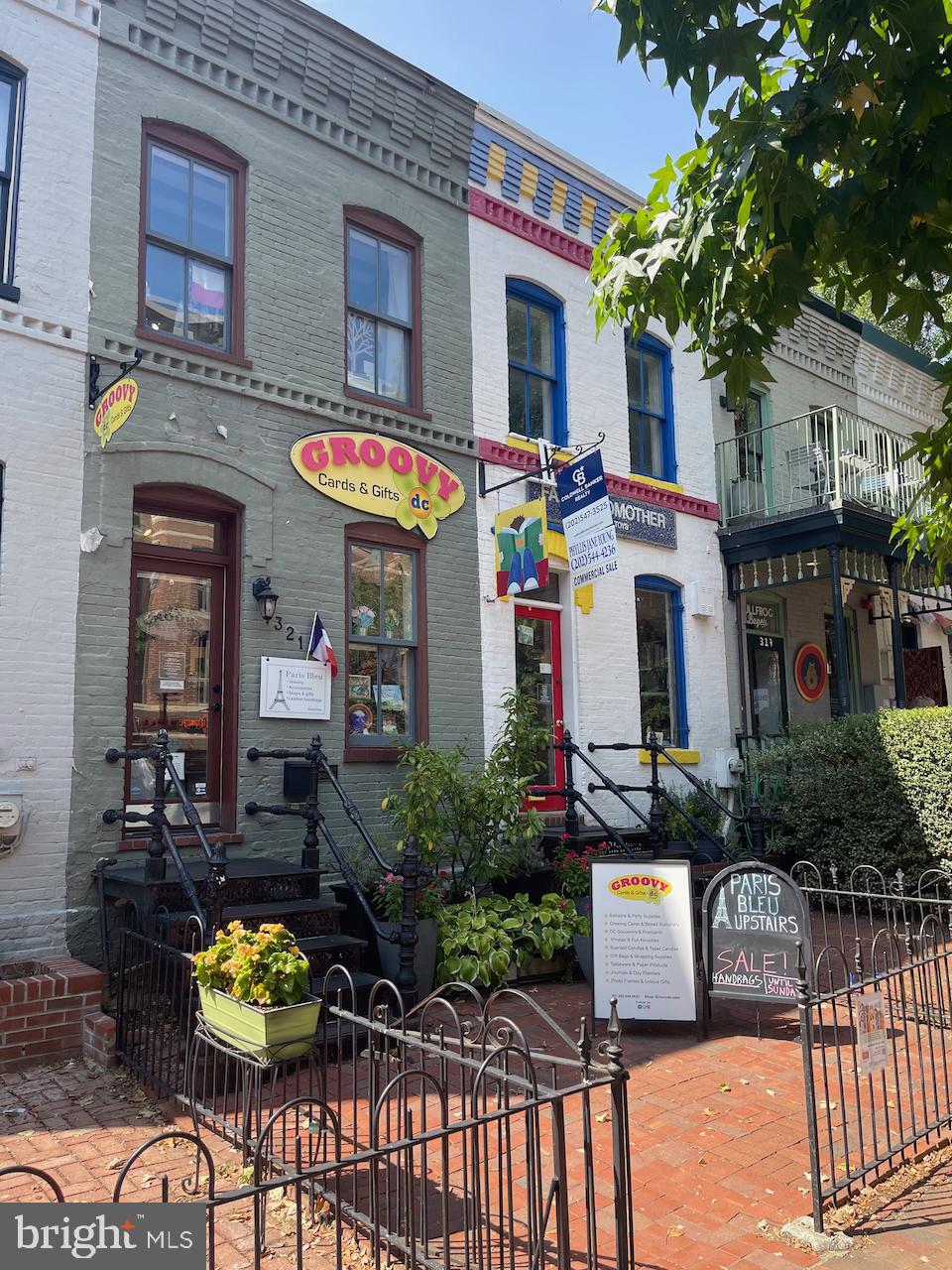 412 13th Street Southeast Washington, DC 20003 - Photo 58 of 62 a front view of a building with outdoor seating