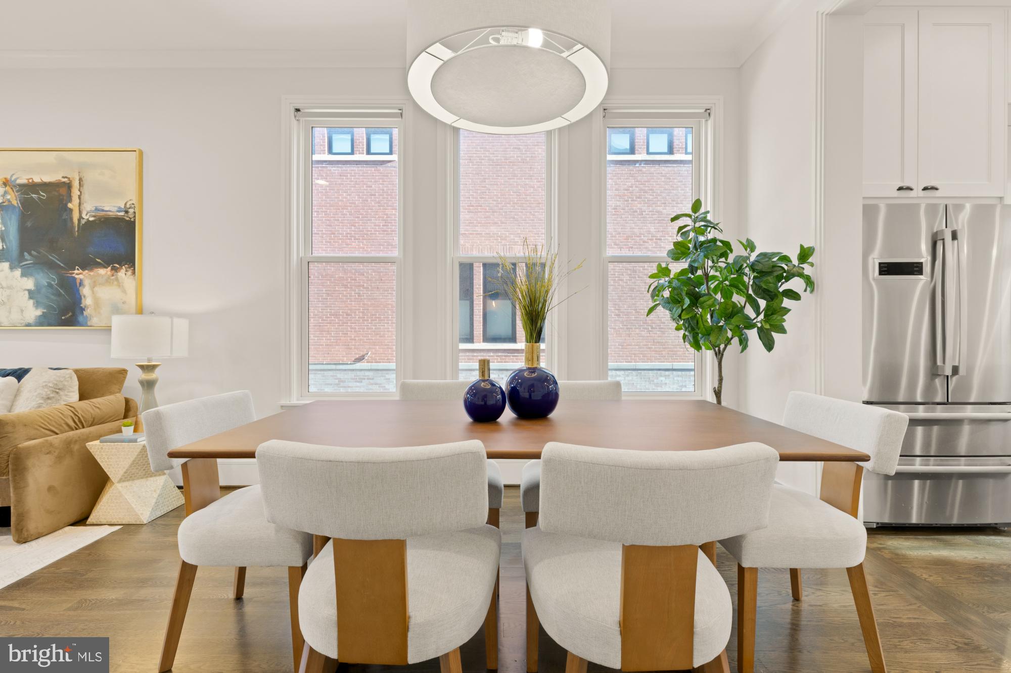 412 13th Street Southeast Washington, DC 20003 - Photo 5 of 62 a dining room with furniture and a potted plant
