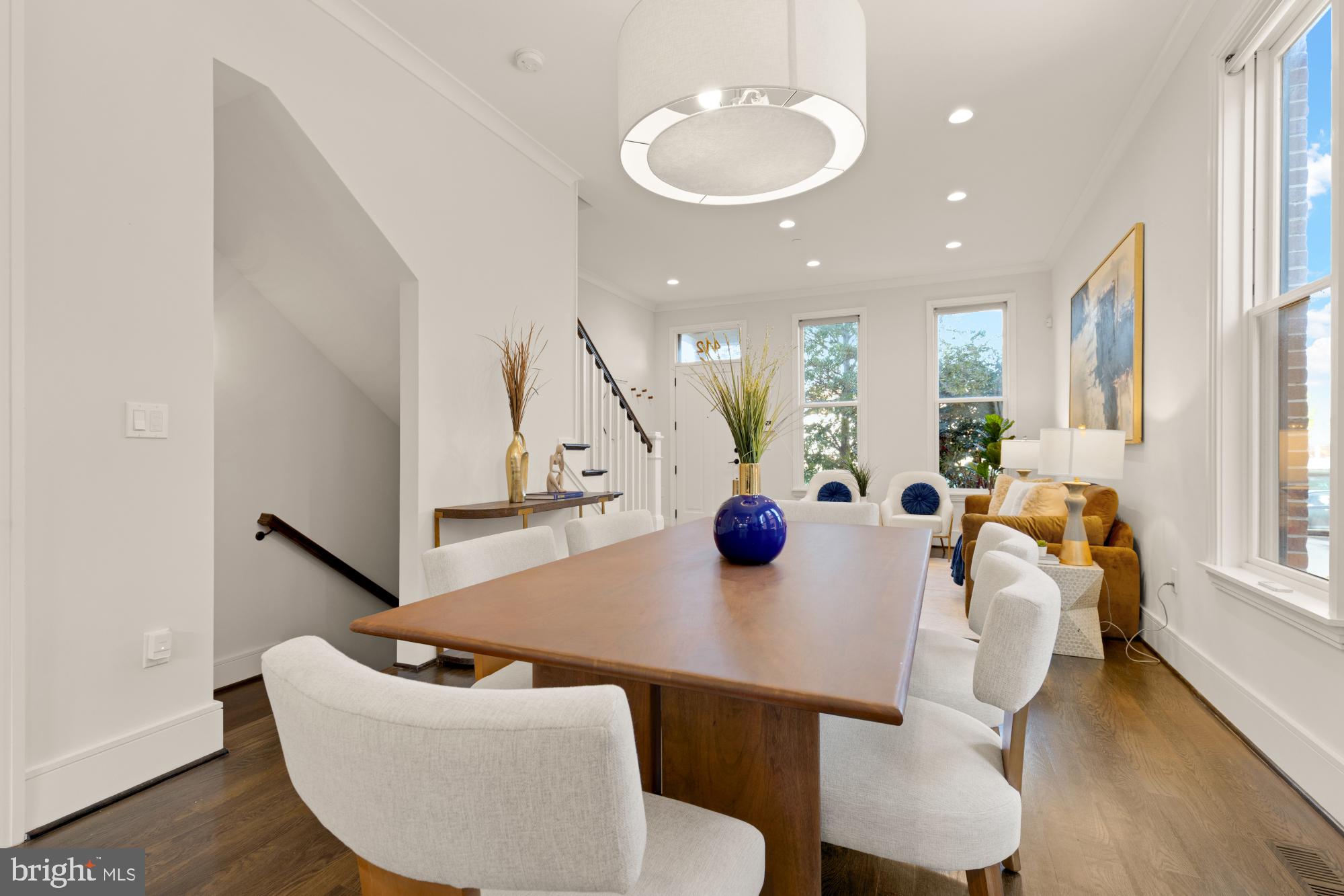 412 13th Street Southeast Washington, DC 20003 - Photo 6 of 62 a view of a dining room with furniture and a potted plant