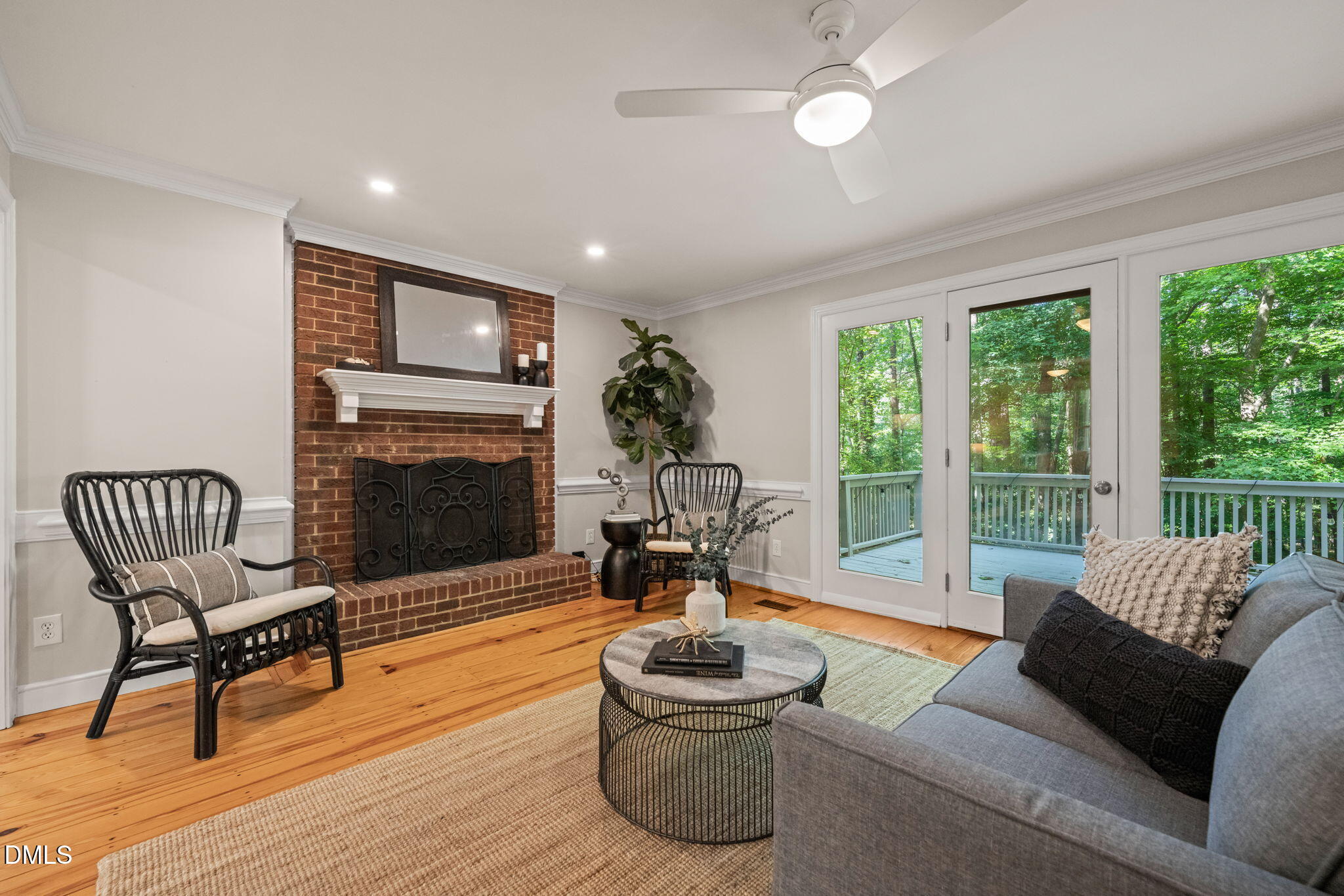 18 Strawberry Ridge Lane Durham, NC 27713 - Photo 10 of 59 a living room with furniture and a fireplace