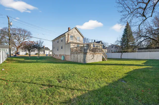 a view of a backyard with pathway