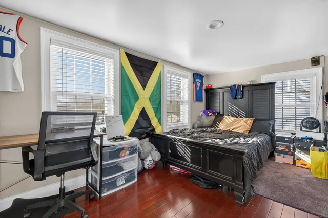 a room with furniture and flat screen tv