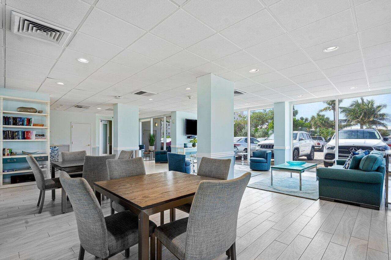 2800 South Ocean Boulevard, Unit 22M Boca Raton, FL 33432 - Photo 20 of 29 a view of a dining room with furniture window and wooden floor