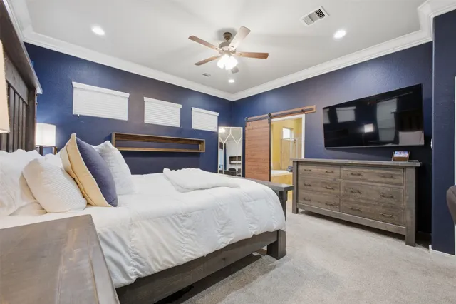 a spacious bathroom with a tub sink and mirror