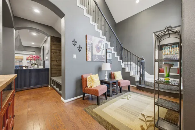 a living room with fireplace furniture and a flat screen tv