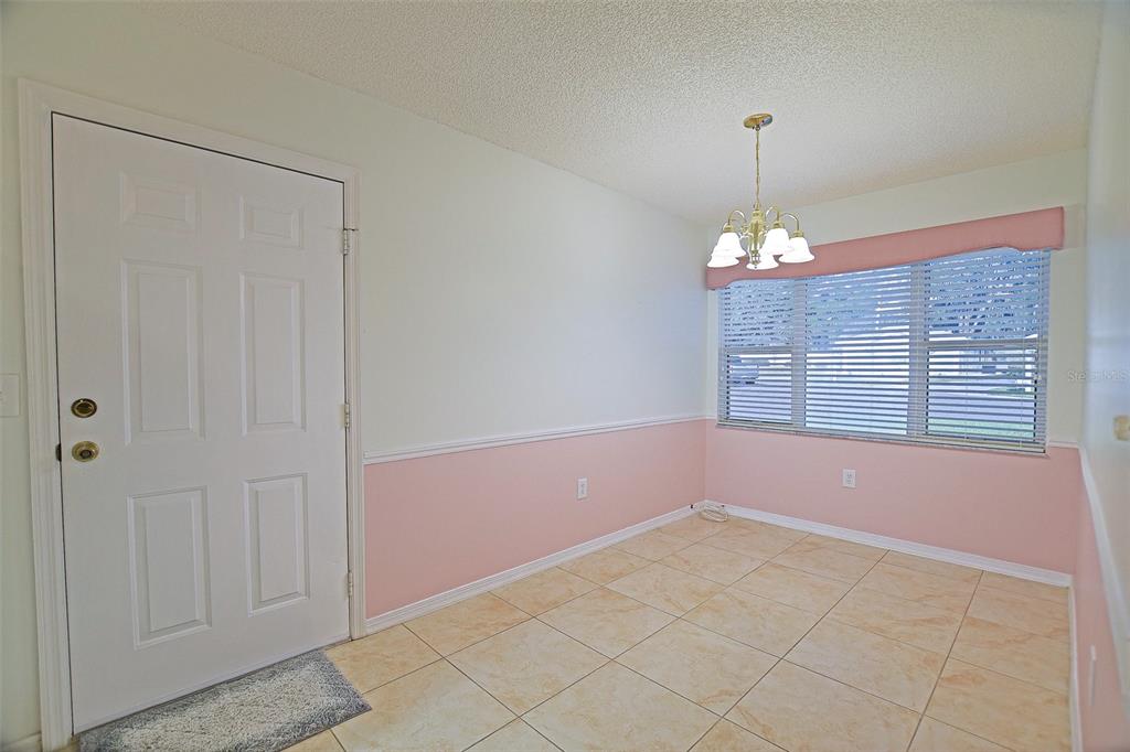 10046 Southeast 175 Street Summerfield, FL 34491 - Photo 11 of 27 a view of livingroom with window