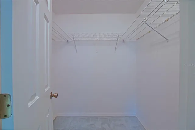 a bathroom with a double vanity sink mirror and vanity