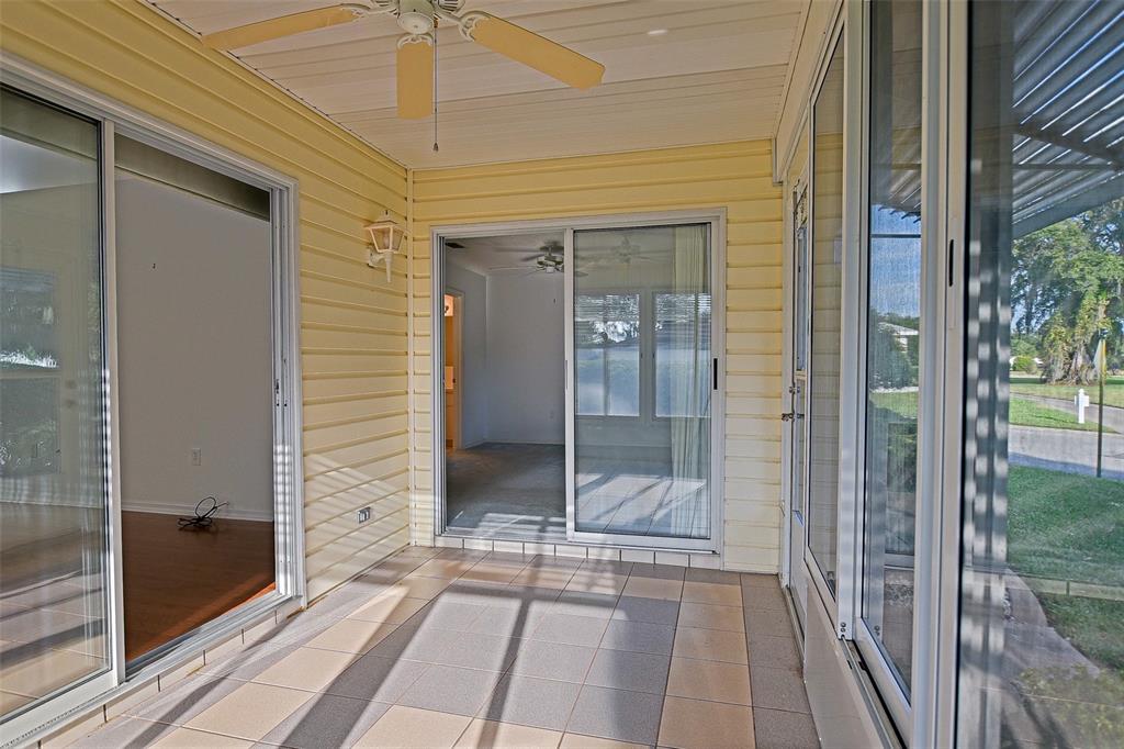 10046 Southeast 175 Street Summerfield, FL 34491 - Photo 25 of 27 a view of a bathroom with a glass door