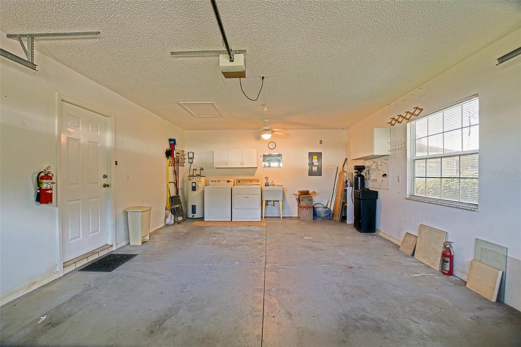 10046 Southeast 175 Street Summerfield, FL 34491 - Photo 26 of 27 a view of a storage & utility room