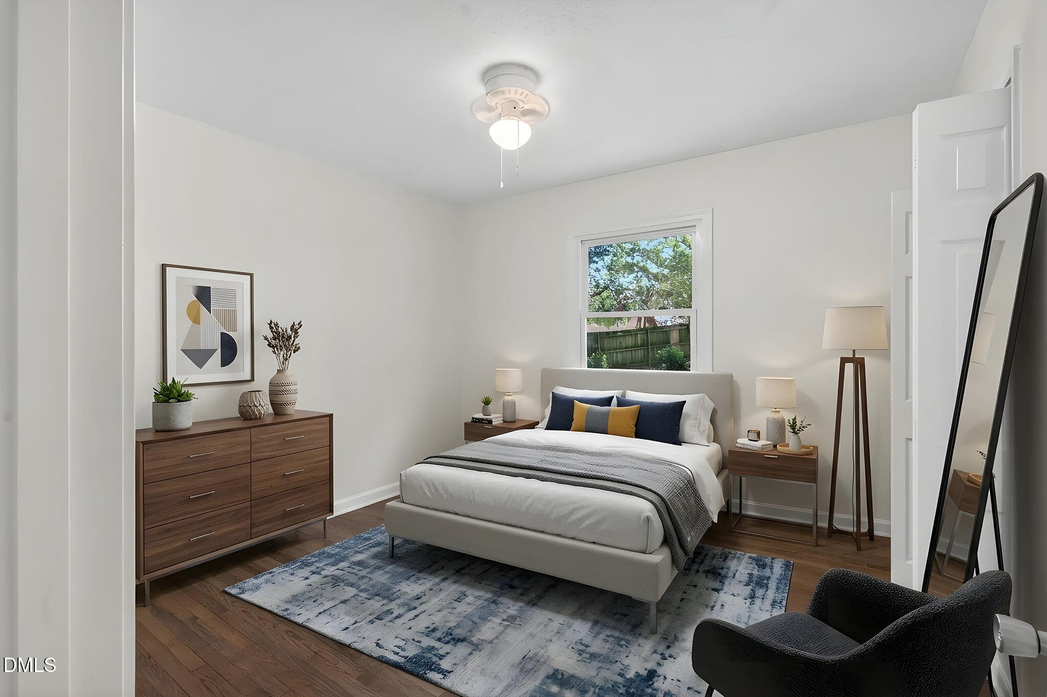 904 Seabrook Road Raleigh, NC 27610 - Photo 11 of 31 a bedroom with a bed and a couch