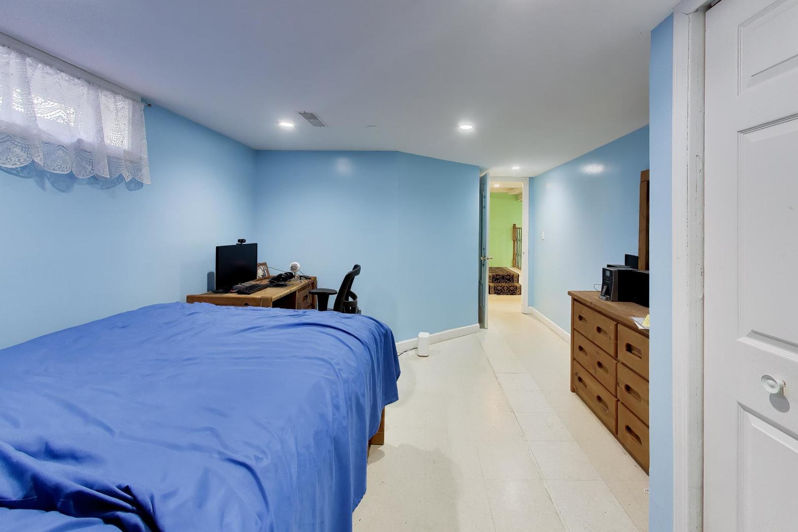 458 West Alma Street Elmhurst, IL 60126 - Photo 21 of 29 a bed room with a bed and a large mirror