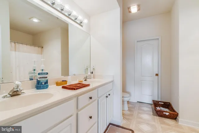 a view of a lake with a city from a terrace