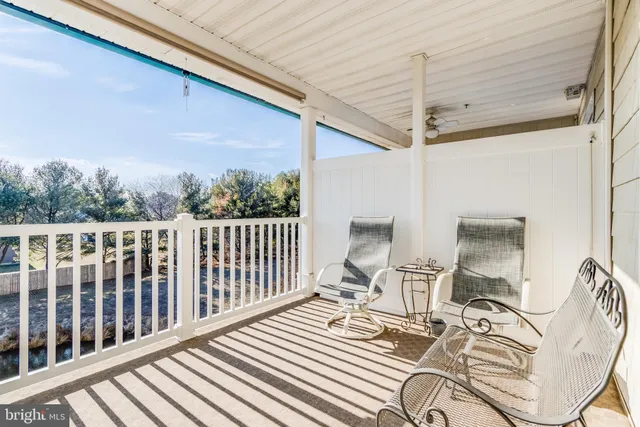 a view of a chairs in patio