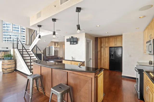 a workspace with furniture and wooden floor