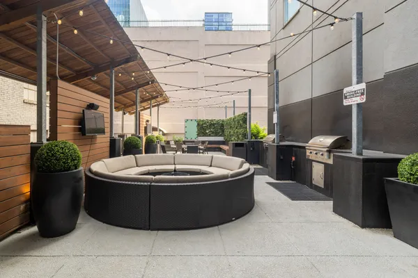 a view of a bathtub and fire pit