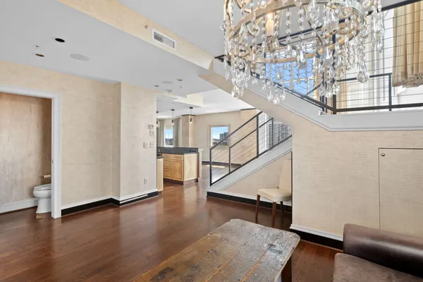 a view of entryway with wooden floor