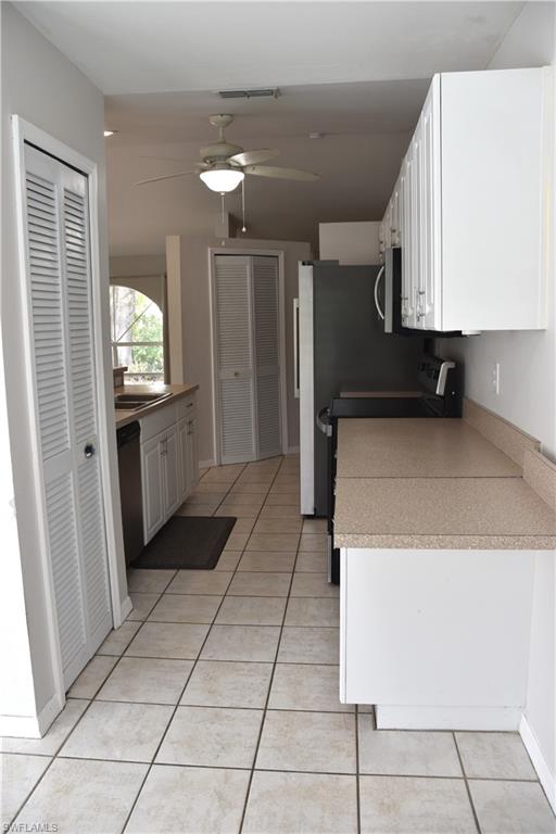 7240 Coolidge Road Fort Myers, FL 33967 - Photo 8 of 30 Galley style kitchen with eat-in kitchen