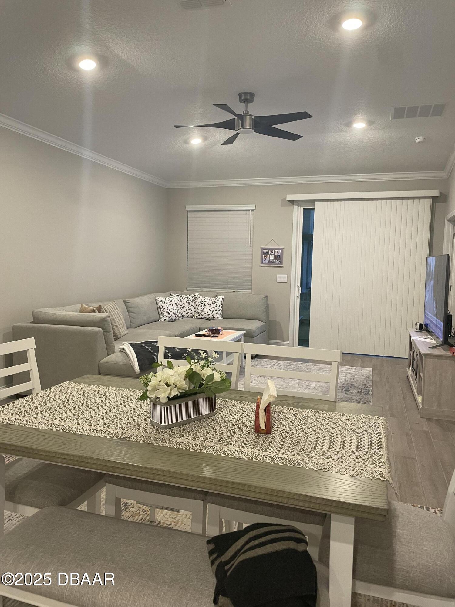 181 Thistleton Way St. Augustine, FL 32092 - Photo 13 of 31 a living room with a couch