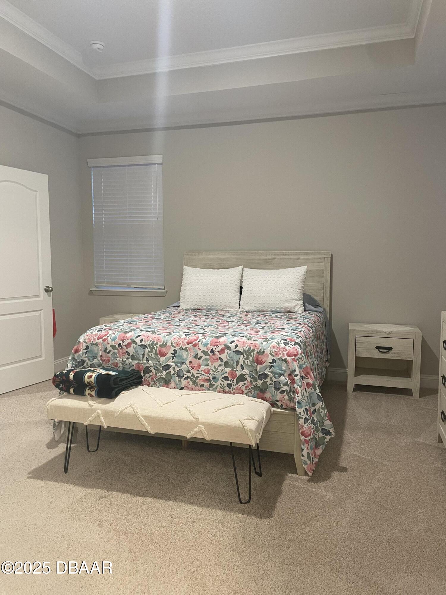 181 Thistleton Way St. Augustine, FL 32092 - Photo 22 of 31 a bedroom with a bed and a couch