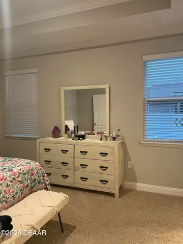 a balcony with table and chairs