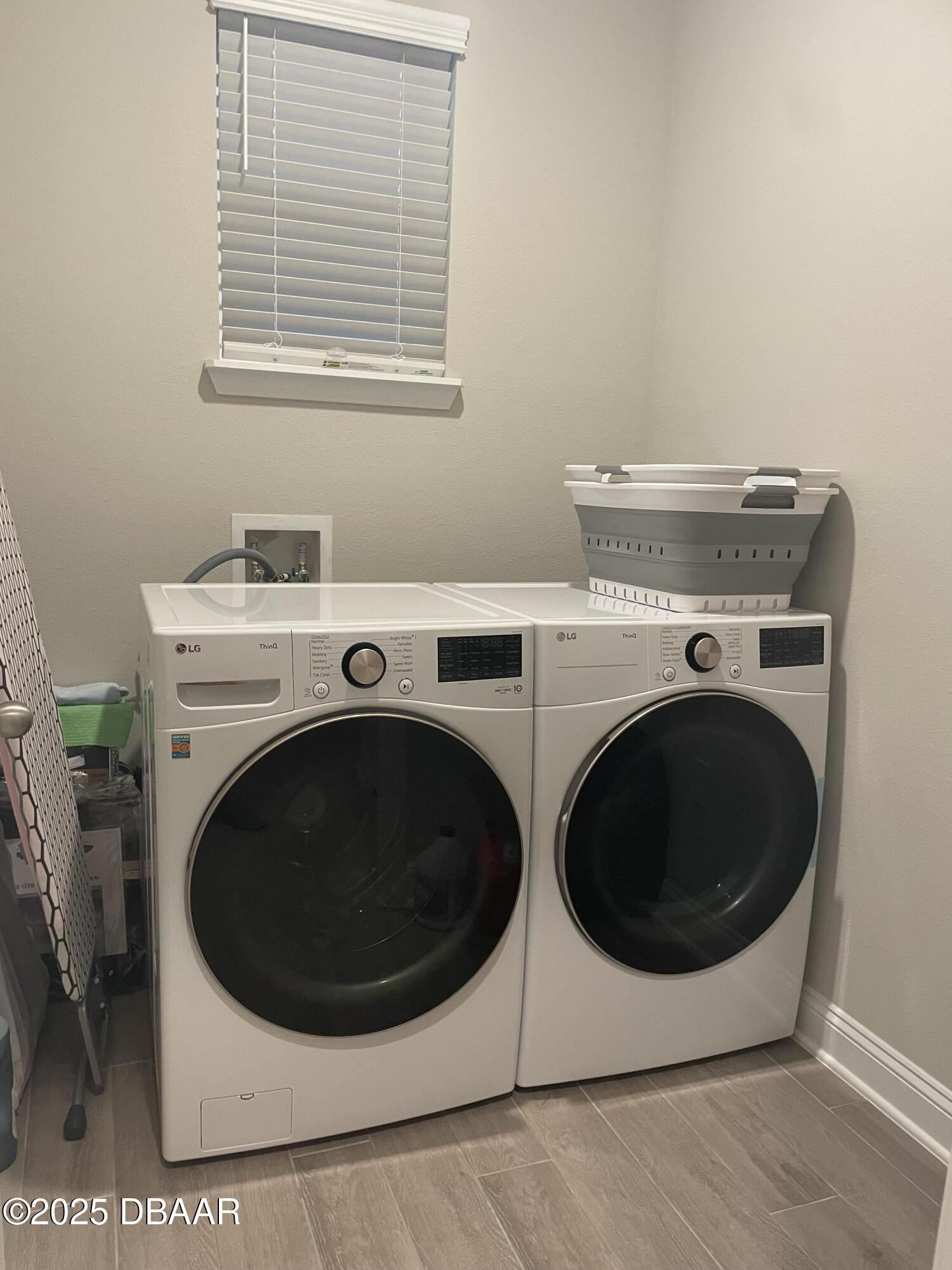 181 Thistleton Way St. Augustine, FL 32092 - Photo 30 of 31 a utility room with dryer and washer