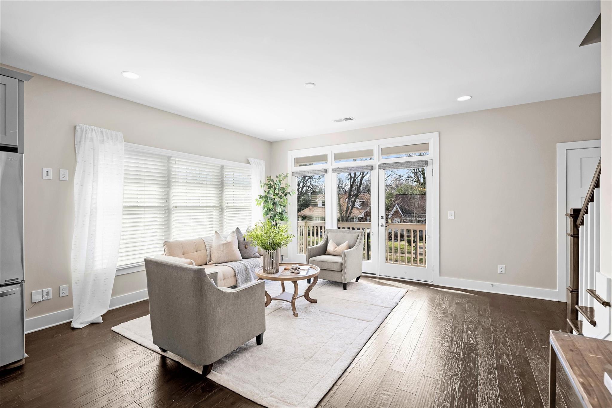 131 Grandin Road Charlotte, NC 28208 - Photo 12 of 45 a living room with furniture and a large window
