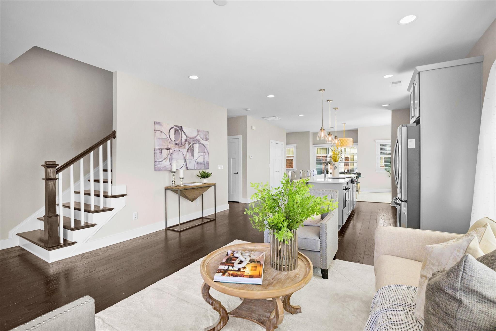 131 Grandin Road Charlotte, NC 28208 - Photo 15 of 45 a living room with furniture potted plant and a painting on the wall