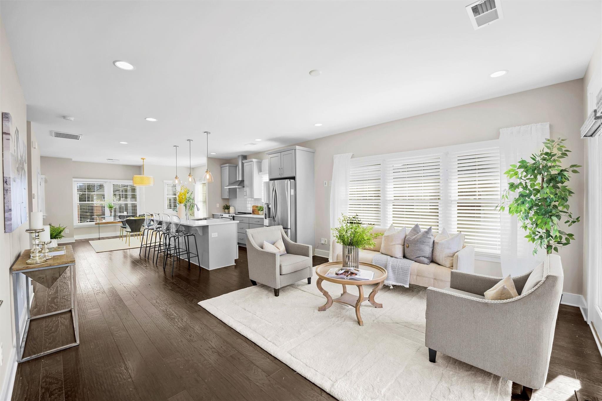 131 Grandin Road Charlotte, NC 28208 - Photo 17 of 45 a living room with fireplace furniture and a large window